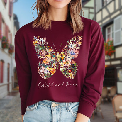Maroon long-sleeve tee with a colorful wildflower butterfly print and "Wild and Free" text.