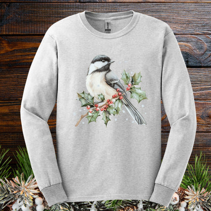 Ash gray long sleeve tee with a watercolor chickadee on a snow-dusted holly branch with red berries.
