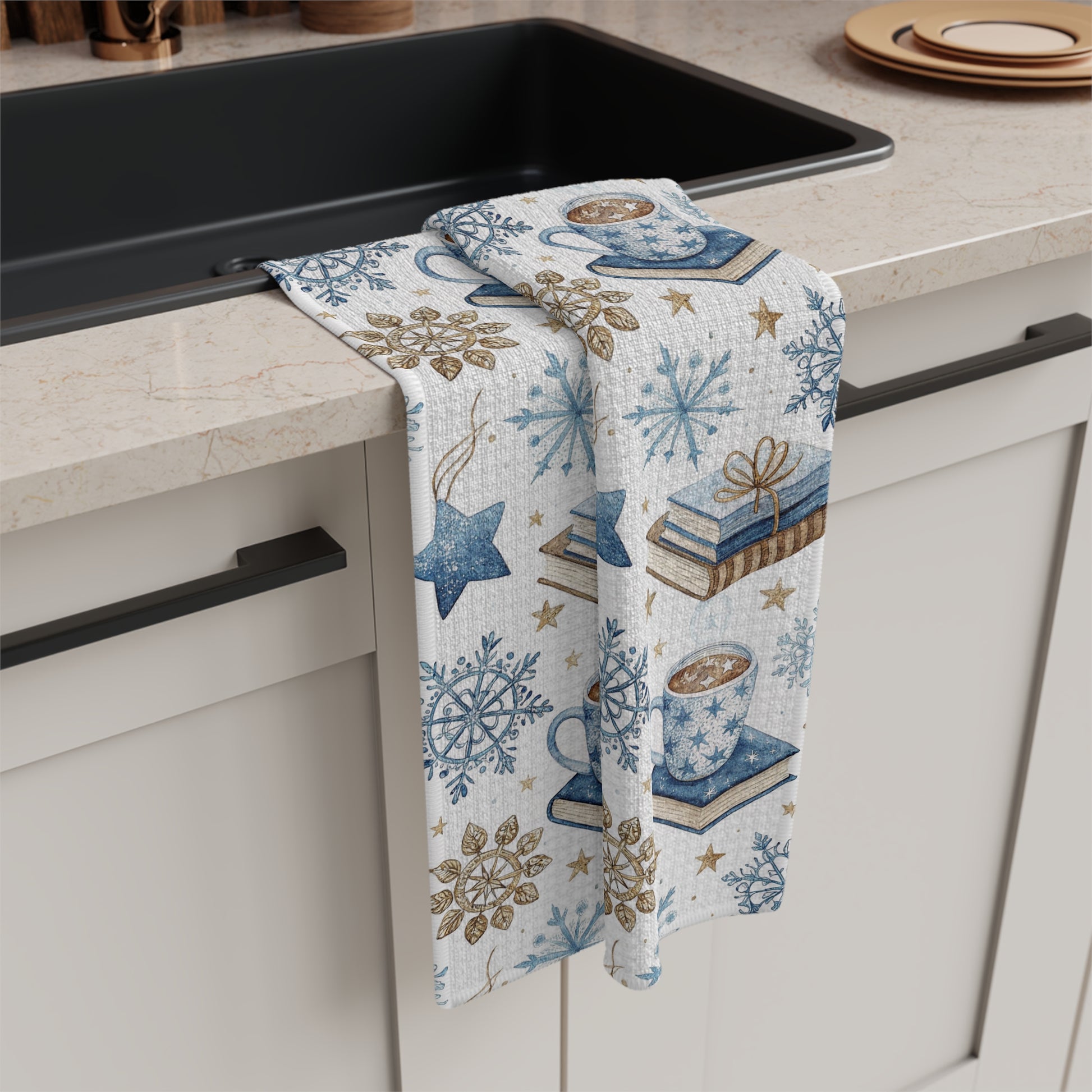 Winter Cup of Cocoa & Books microfiber kitchen towel with blue snowflakes, stars, and stacked books.