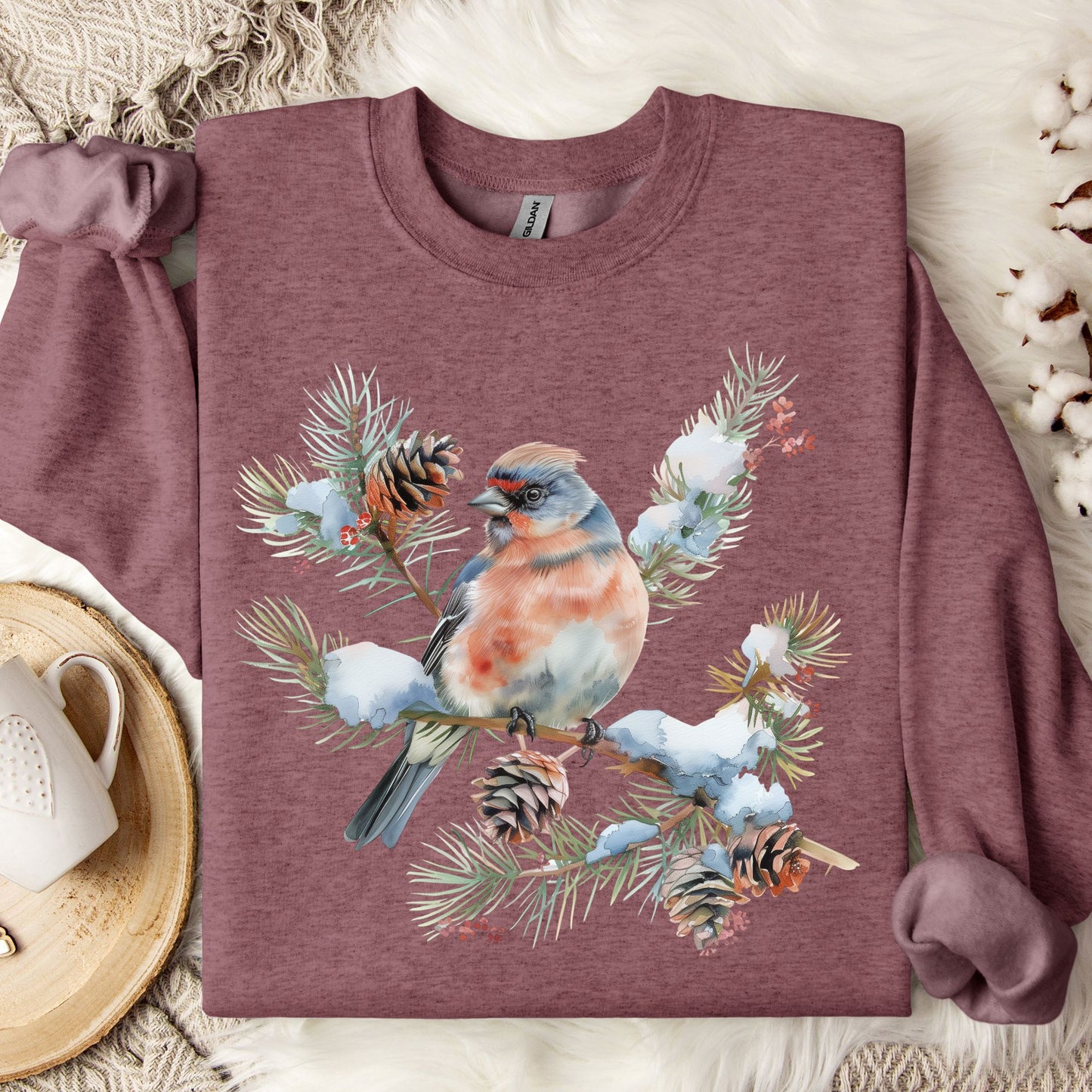 Heather Sport Dark Maroon sweatshirt with a crested songbird on a snowy evergreen branch design.