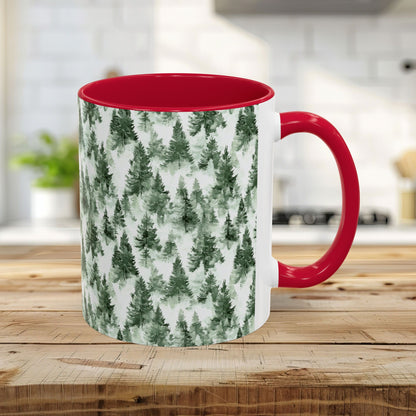 11oz ceramic mug with a watercolor evergreen forest pattern, red handle, and red interior.