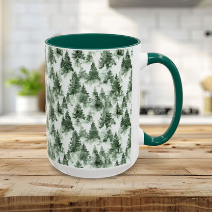 15oz ceramic mug with a watercolor evergreen forest pattern, green handle and interior.