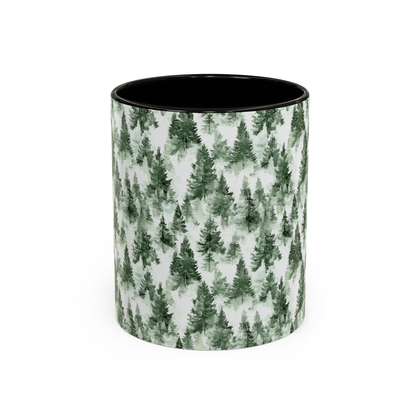 Ceramic mug with a watercolor evergreen forest pattern and a black handle and interior.