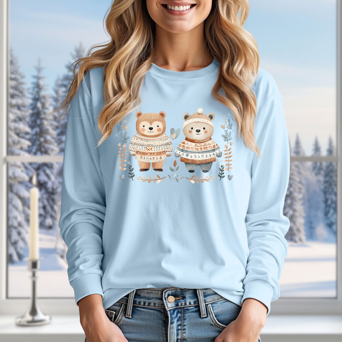 Light blue long sleeve tee with two watercolor bears in Fair Isle sweaters, winter foliage, and snowflakes.