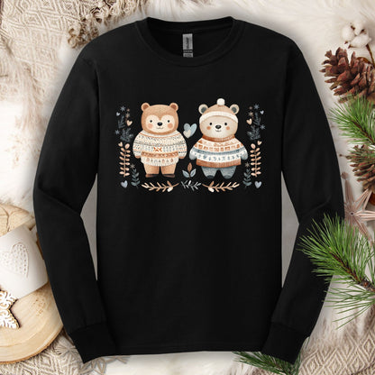 Black long-sleeve tee with two cute bears in Fair Isle sweaters, surrounded by winter foliage and snowflakes.