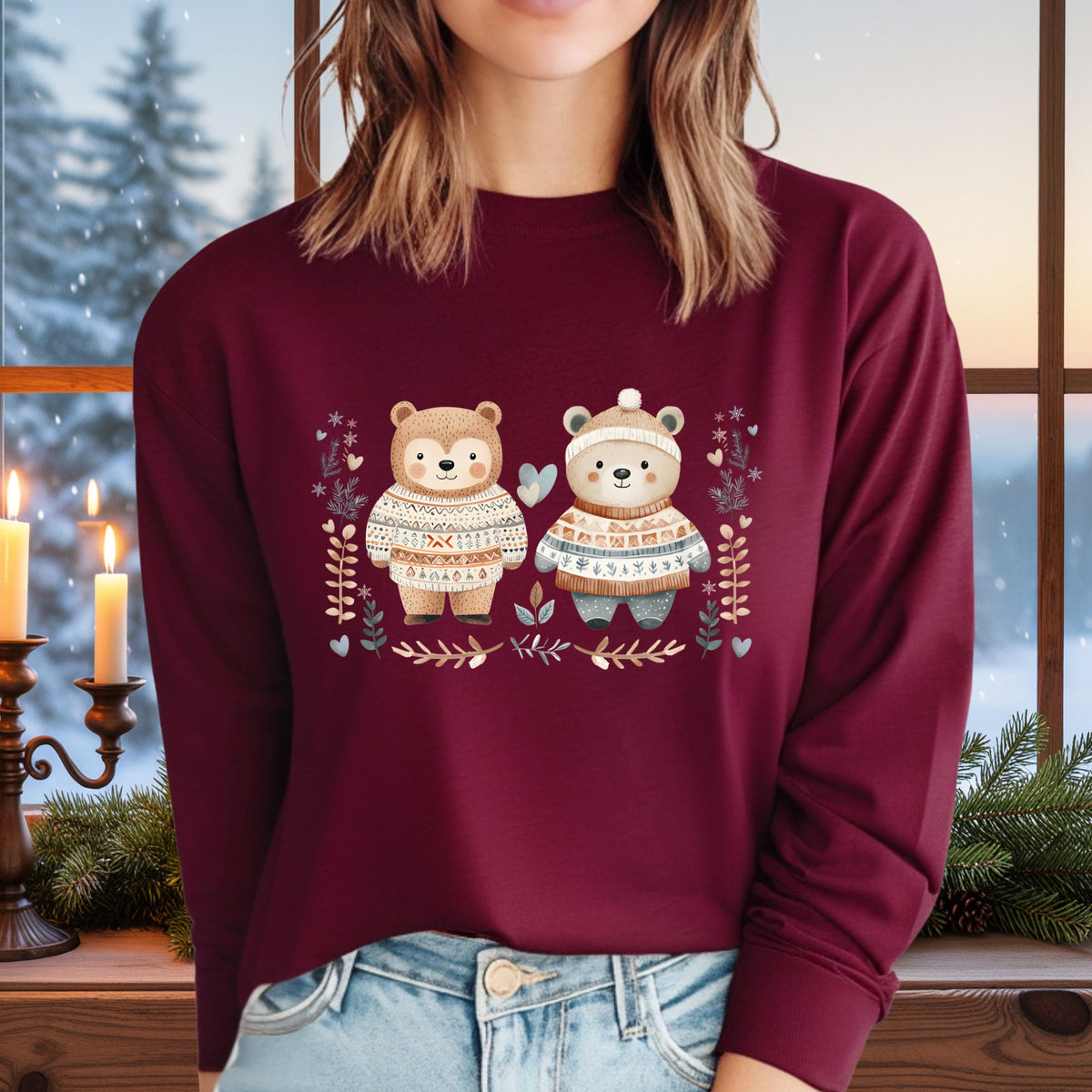 Maroon long-sleeve tee with two cute bears in Fair Isle sweaters, winter foliage, and snowflakes.