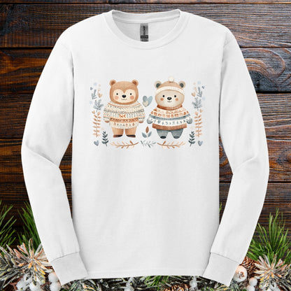White long sleeve tee with two watercolor bears in Fair Isle sweaters, winter foliage, and snowflakes.