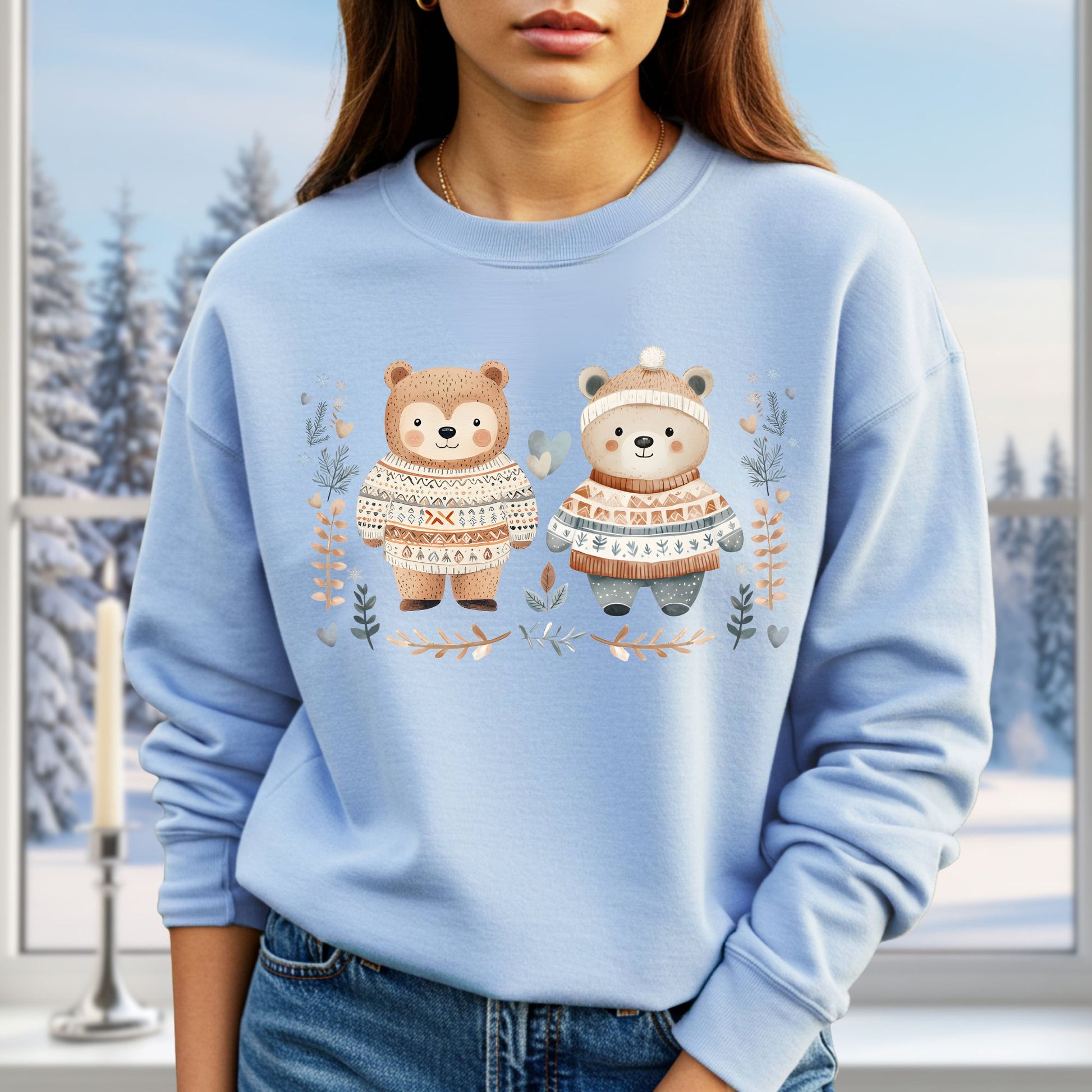 Light blue sweatshirt with two fair isle sweater-clad love bears, winter foliage, snowflakes, and hearts.