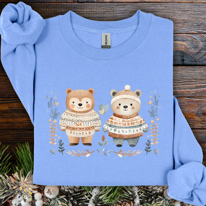 Carolina Blue S sweatshirt with two love bears in Fair Isle sweaters, winter foliage, snowflakes, and hearts.