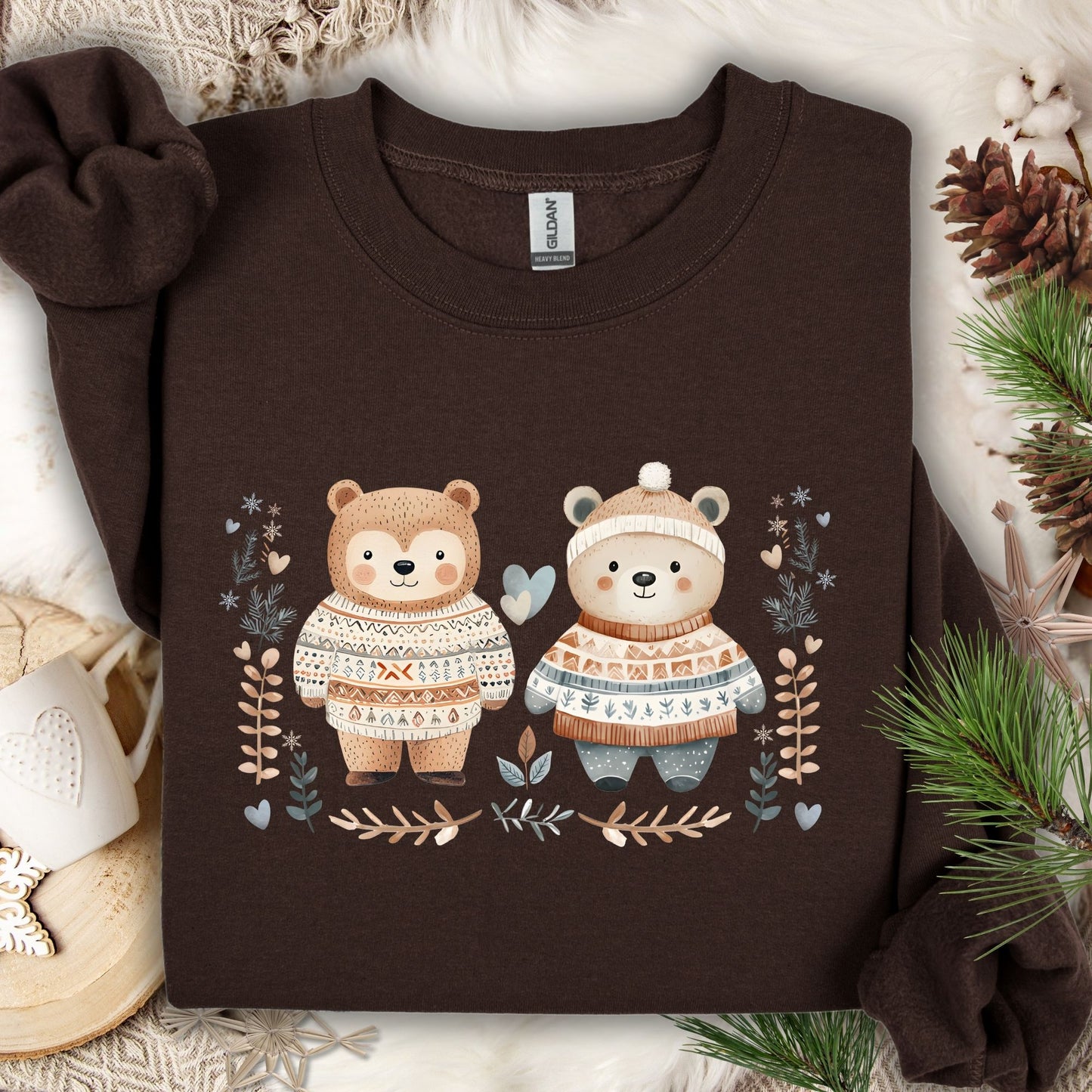 Dark Chocolate heavy blend sweatshirt with two love bears in Fair Isle sweaters, winter foliage, and hearts.