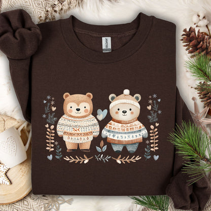 Dark Chocolate heavy blend sweatshirt with two love bears in Fair Isle sweaters, winter foliage, and hearts.