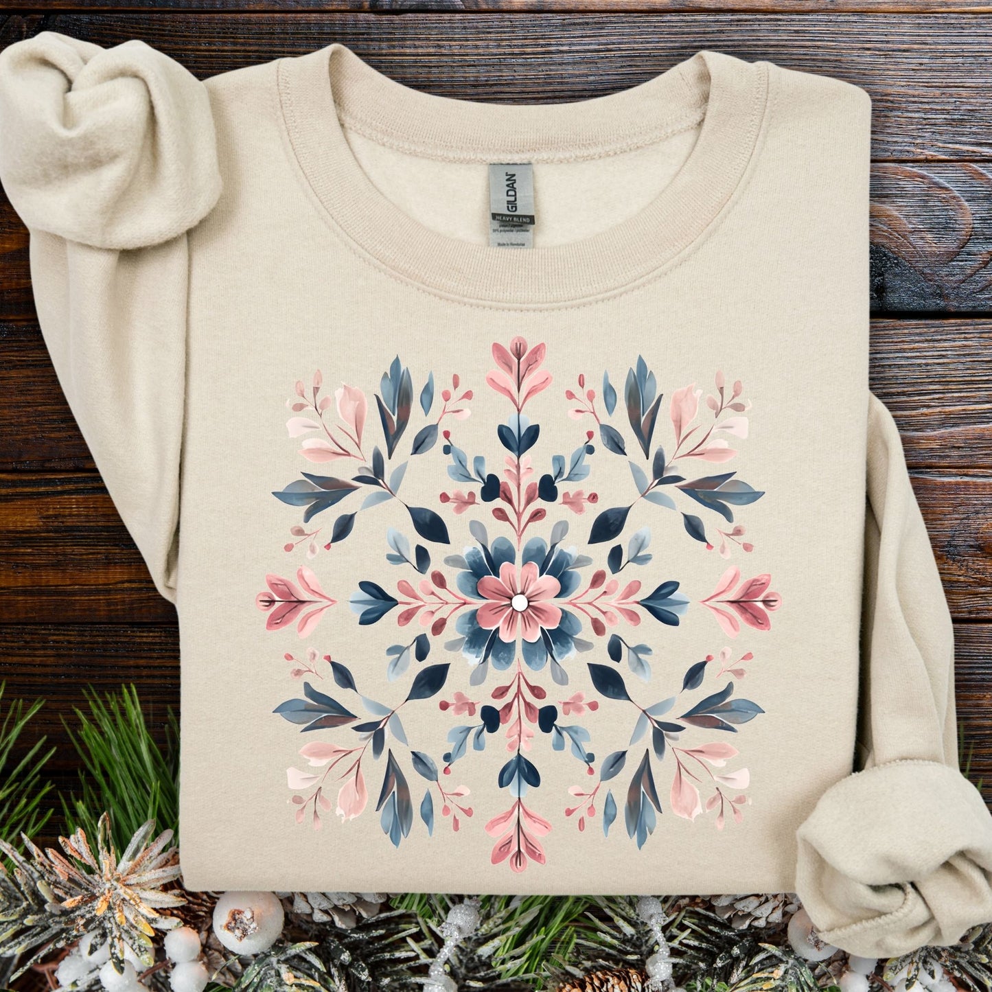 Sand S-size sweatshirt with a pink and blue floral mandala snowflake design.