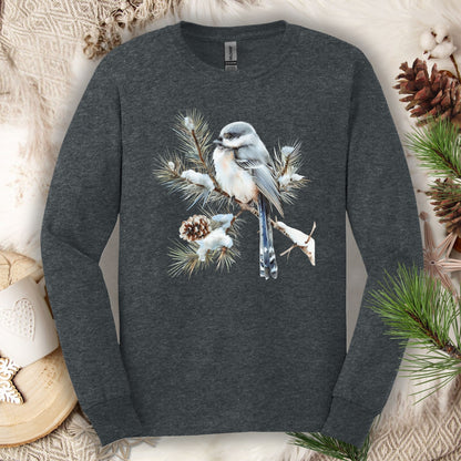 Dark Heather long sleeve tee with a watercolor long-tailed tit on a snowy evergreen branch.