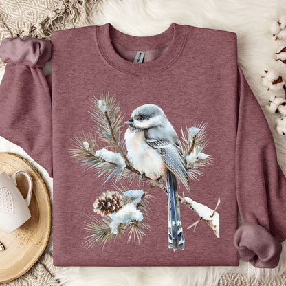 Heather Sport Dark Maroon Gildan sweatshirt with a watercolor long-tailed tit on a snowy evergreen branch.