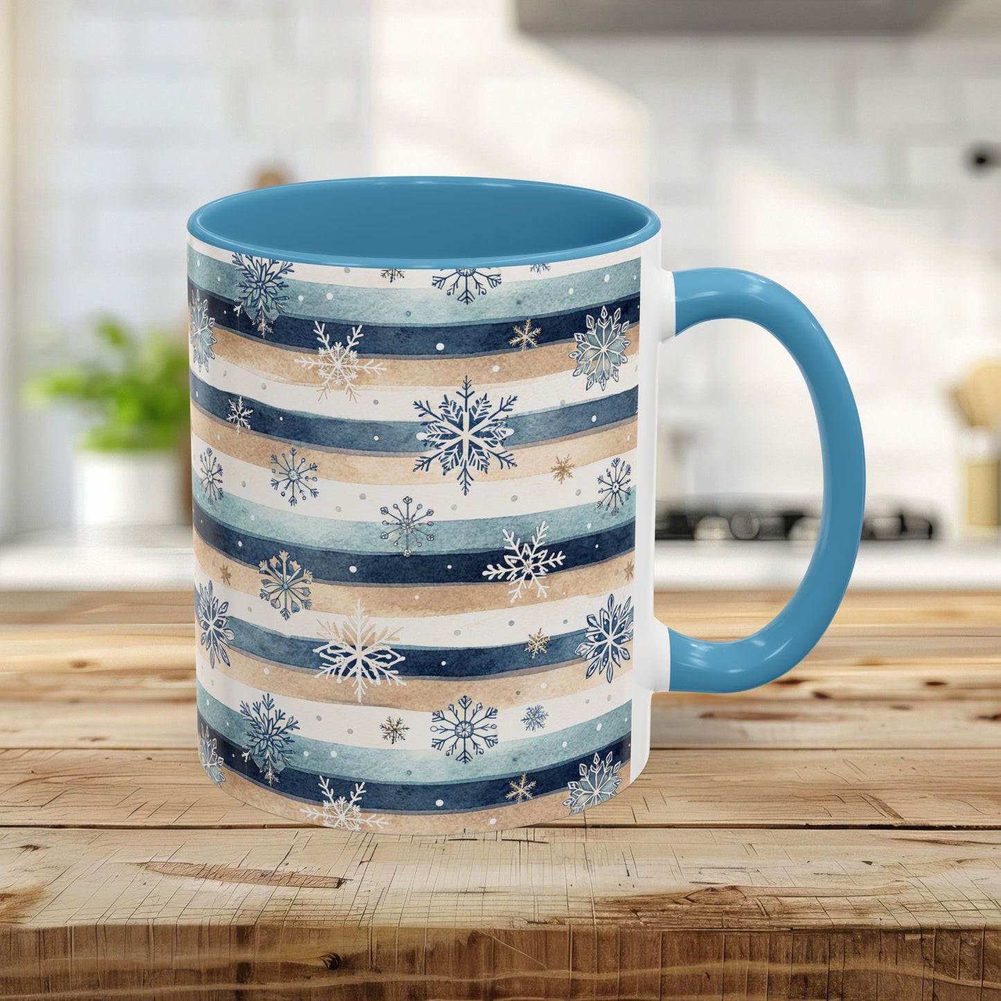 11oz ceramic mug with watercolor blue and beige stripes, hand-painted snowflakes, and a light blue interior and handle.