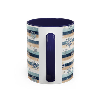 Winter Snowflake & Stripes ceramic mug with blue and sandy beige watercolor stripes, snowflakes, and a navy interior and handle.