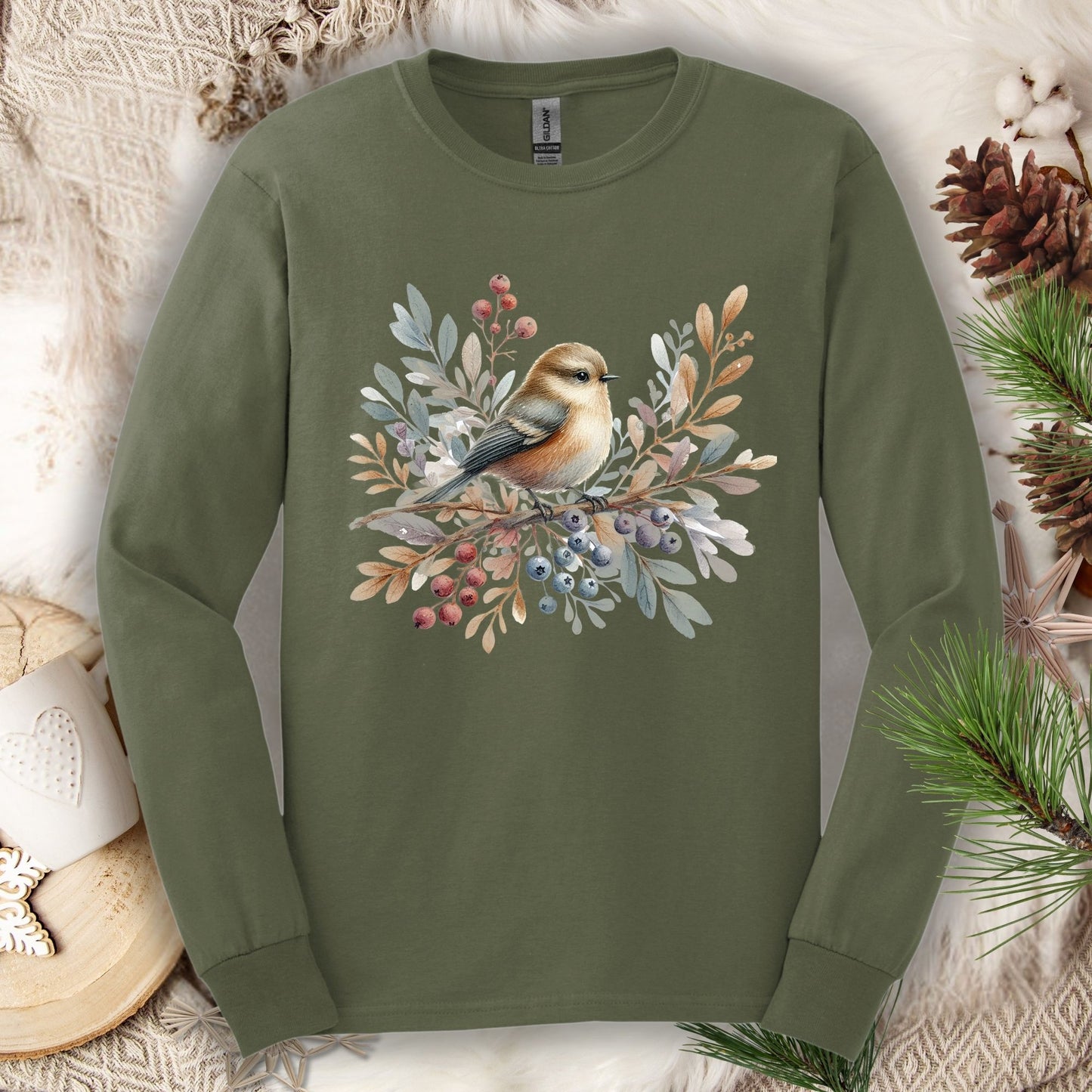 Military Green long sleeve tee with a boho sparrow on snowy branches and winter berries.