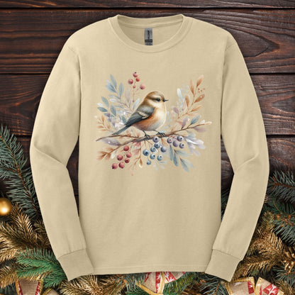 Sand Gildan long sleeve tee with a boho sparrow on snowy branches and winter berries.