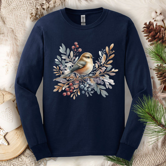 Navy long sleeve tee with a boho-style sparrow on snowy branches with winter berries.