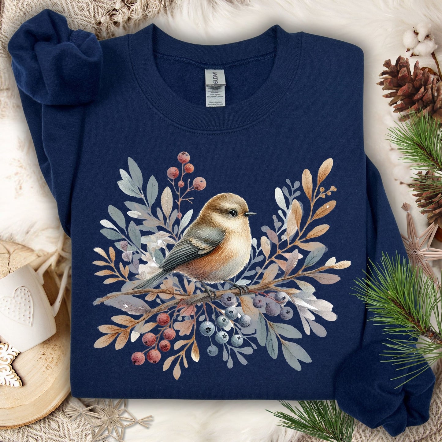 Navy Gildan crewneck sweatshirt with a watercolor winter sparrow, berries, and foliage design.