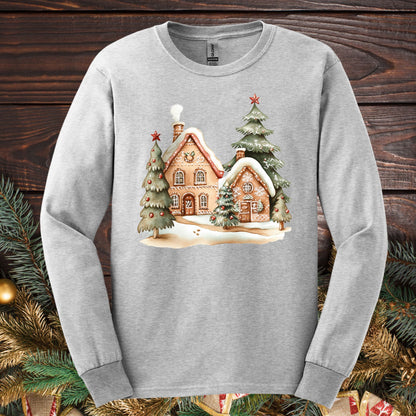 Ash Gildan 2400 long sleeve tee with watercolor gingerbread homes, evergreens, and snow design.