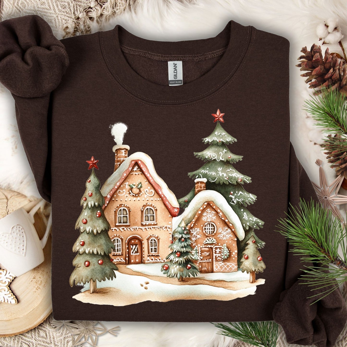 Dark chocolate Gildan 18000 sweatshirt with a gingerbread village and Christmas trees design.