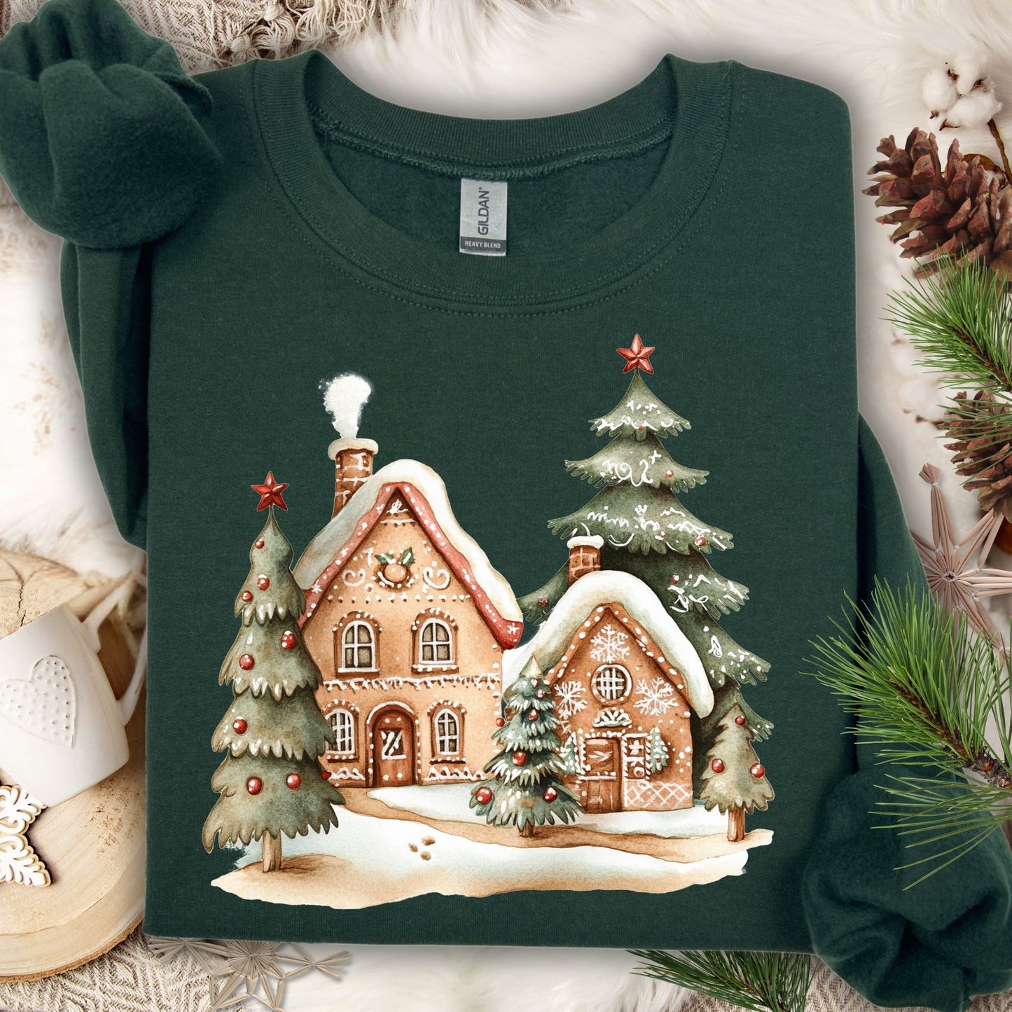 Forest Green Gildan 18000 sweatshirt with a whimsical gingerbread village and Christmas trees design.