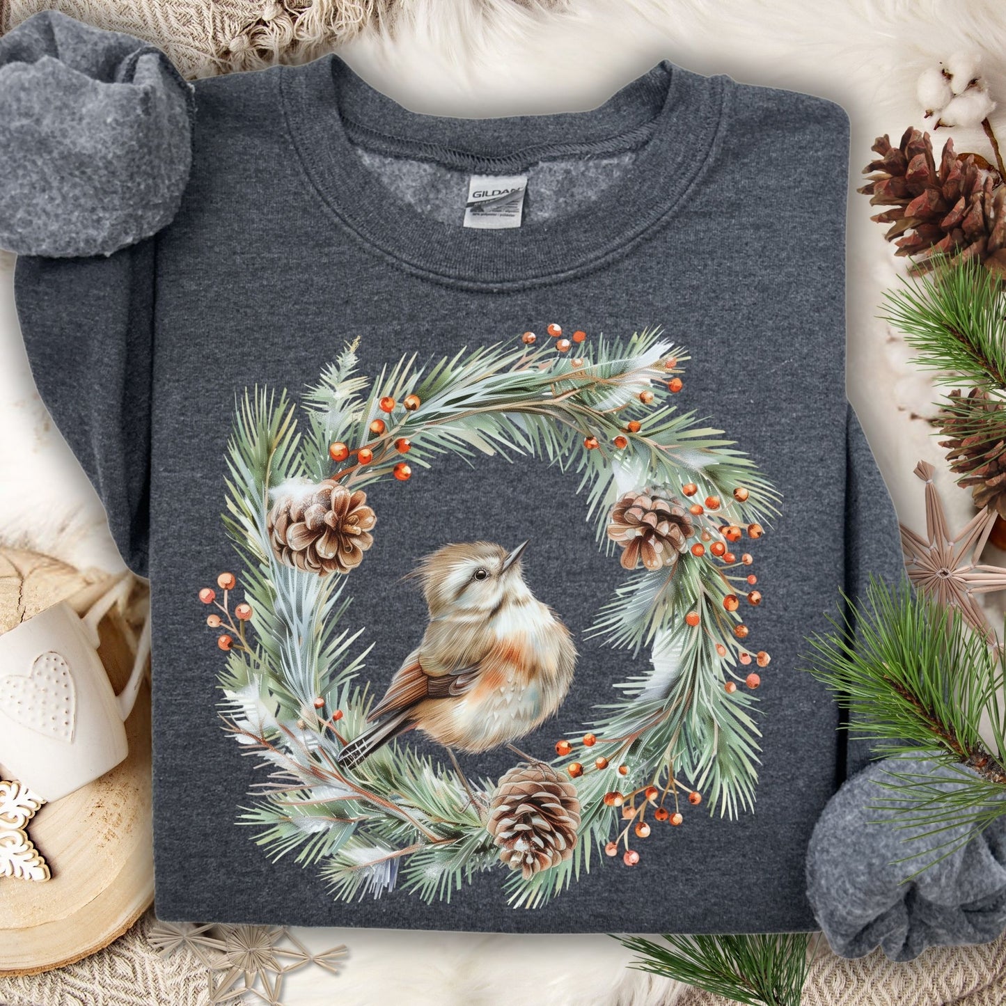 Dark Heather sweatshirt with watercolor wren in evergreen wreath, pinecones, and berries.