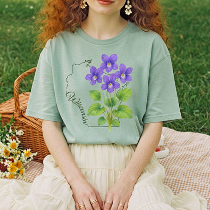Relaxed-fit, garment-dyed sage green t-shirt with watercolor wood violets and a Wisconsin outline.