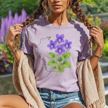 Garment-dyed lavender t-shirt with a watercolor wood violet design and a subtle Wisconsin outline.