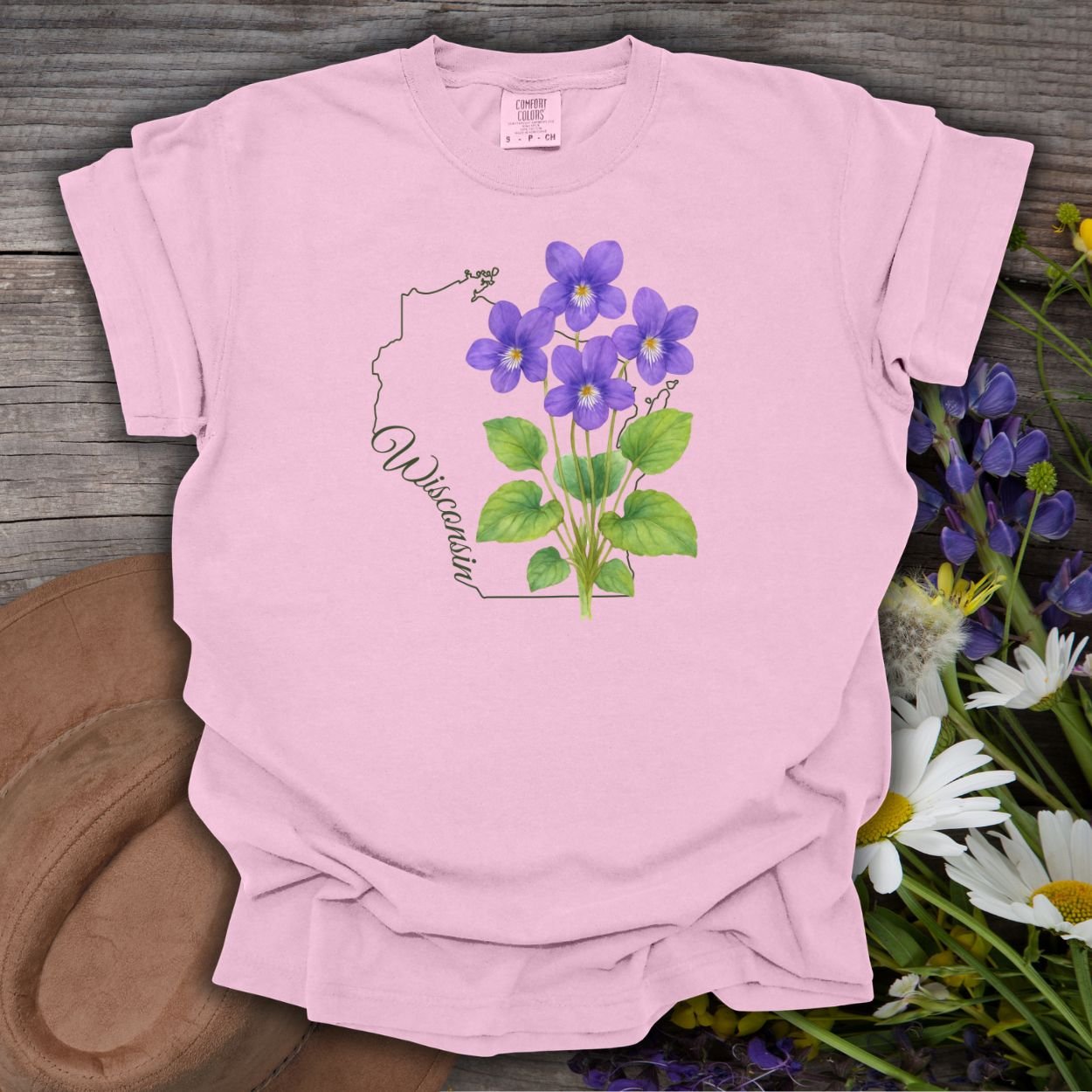 Blossom pink garment-dyed cotton t-shirt with a watercolor wood violet design and "Wisconsin" script.