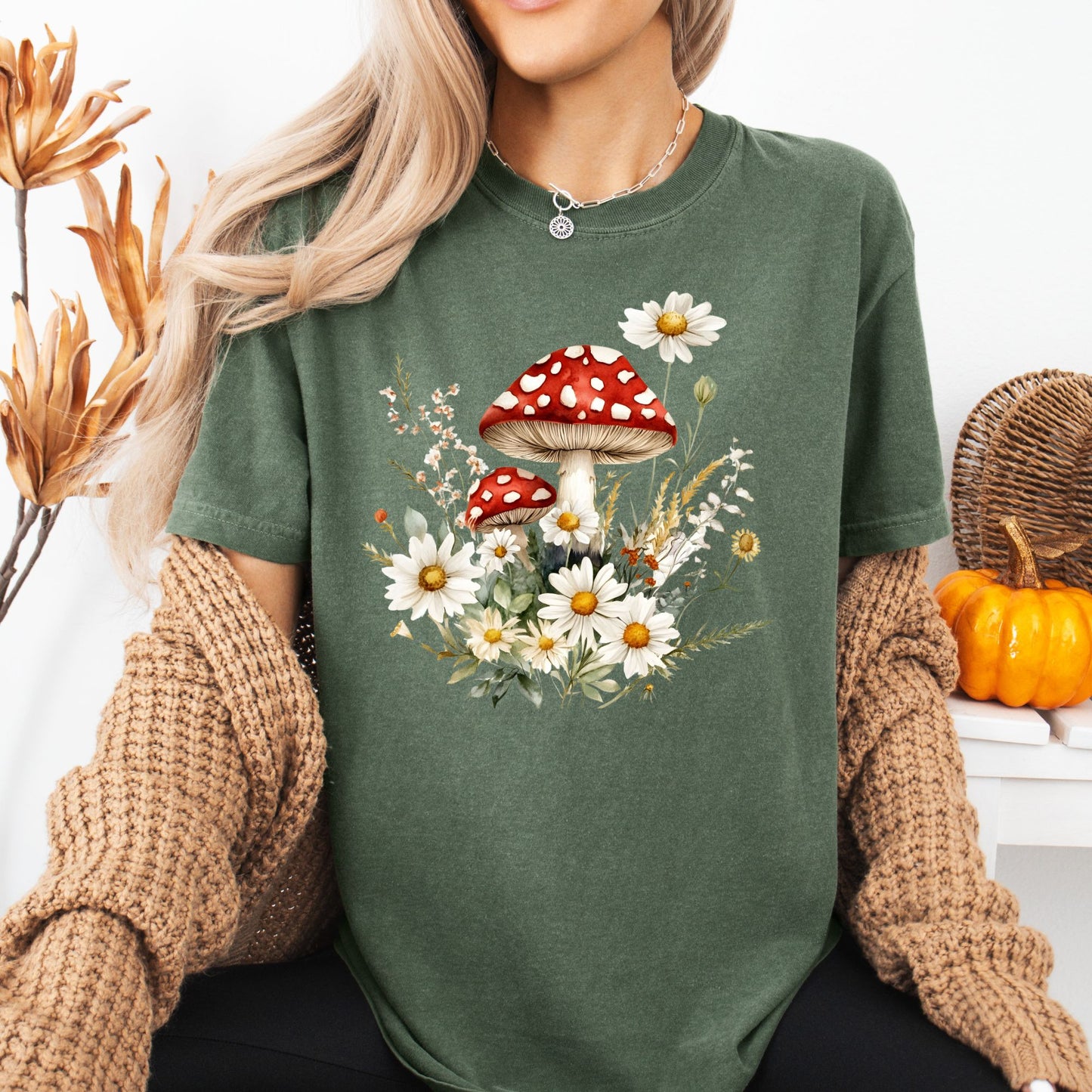 Garment-dyed, relaxed-fit forest green t-shirt with a vintage floral mushroom graphic.