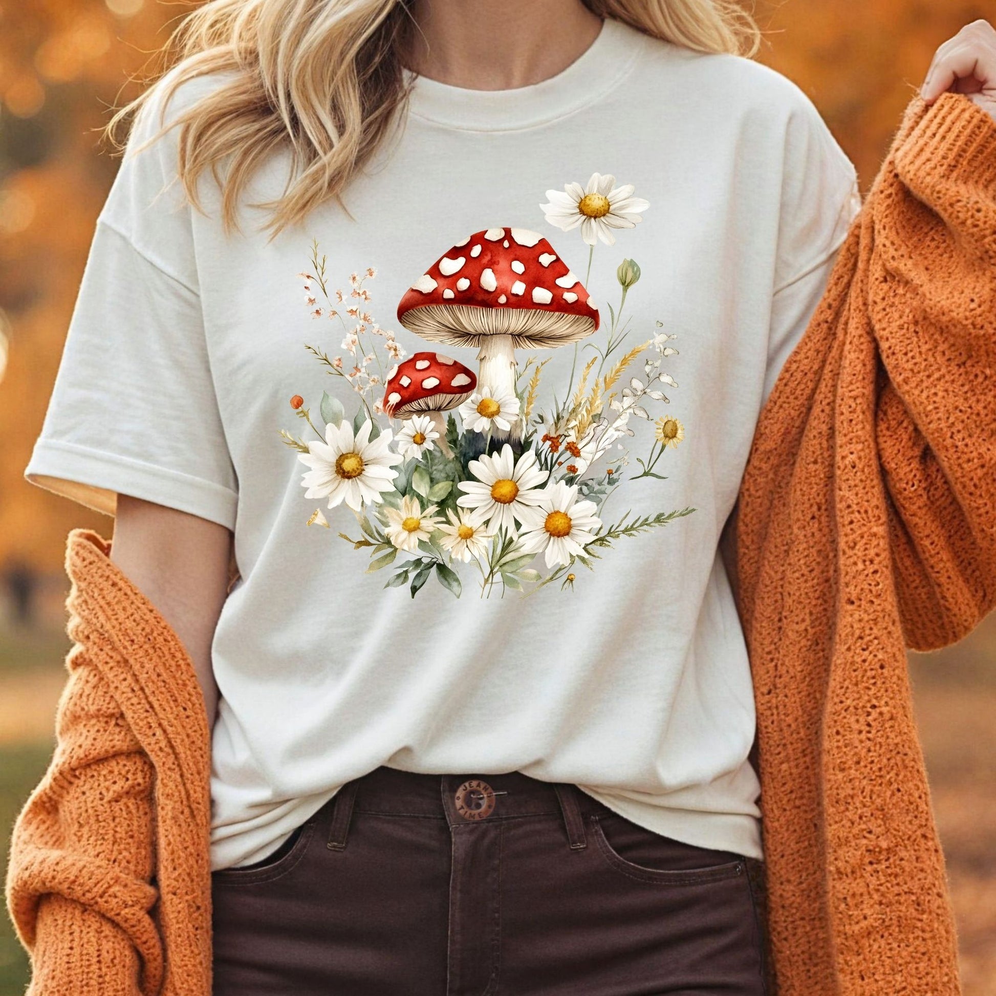 Relaxed-fit, garment-dyed t-shirt with a vintage-inspired red mushroom and daisy floral illustration.