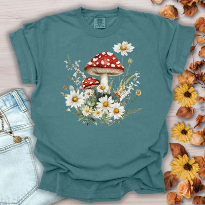 Blue Spruce garment-dyed cotton t-shirt with a vintage floral mushroom and daisy graphic.