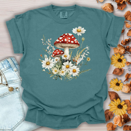 Blue Spruce garment-dyed cotton t-shirt with a vintage floral mushroom and daisy graphic.