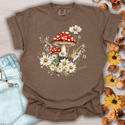 Espresso garment-dyed cotton t-shirt with a vintage woodland floral mushroom and daisy illustration.