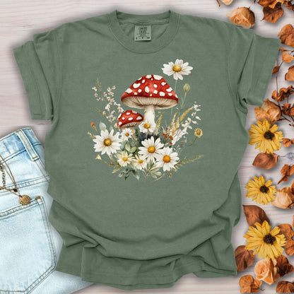 Moss green relaxed-fit t-shirt with a vintage woodland floral mushroom and daisy illustration.