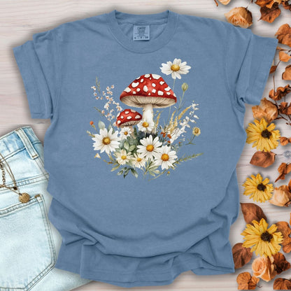 Blue Jean garment-dyed t-shirt with a vintage woodland floral mushroom and daisy illustration.