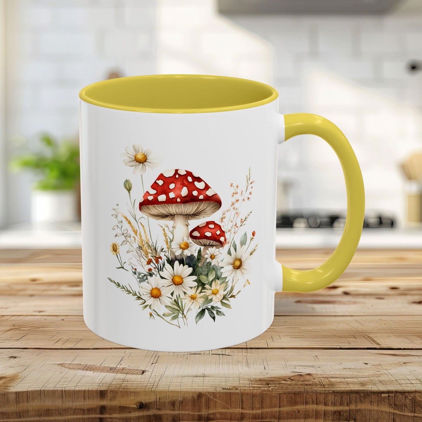 11oz ceramic mug with a yellow interior and handle, featuring a watercolor print of red-capped mushrooms and daisies.