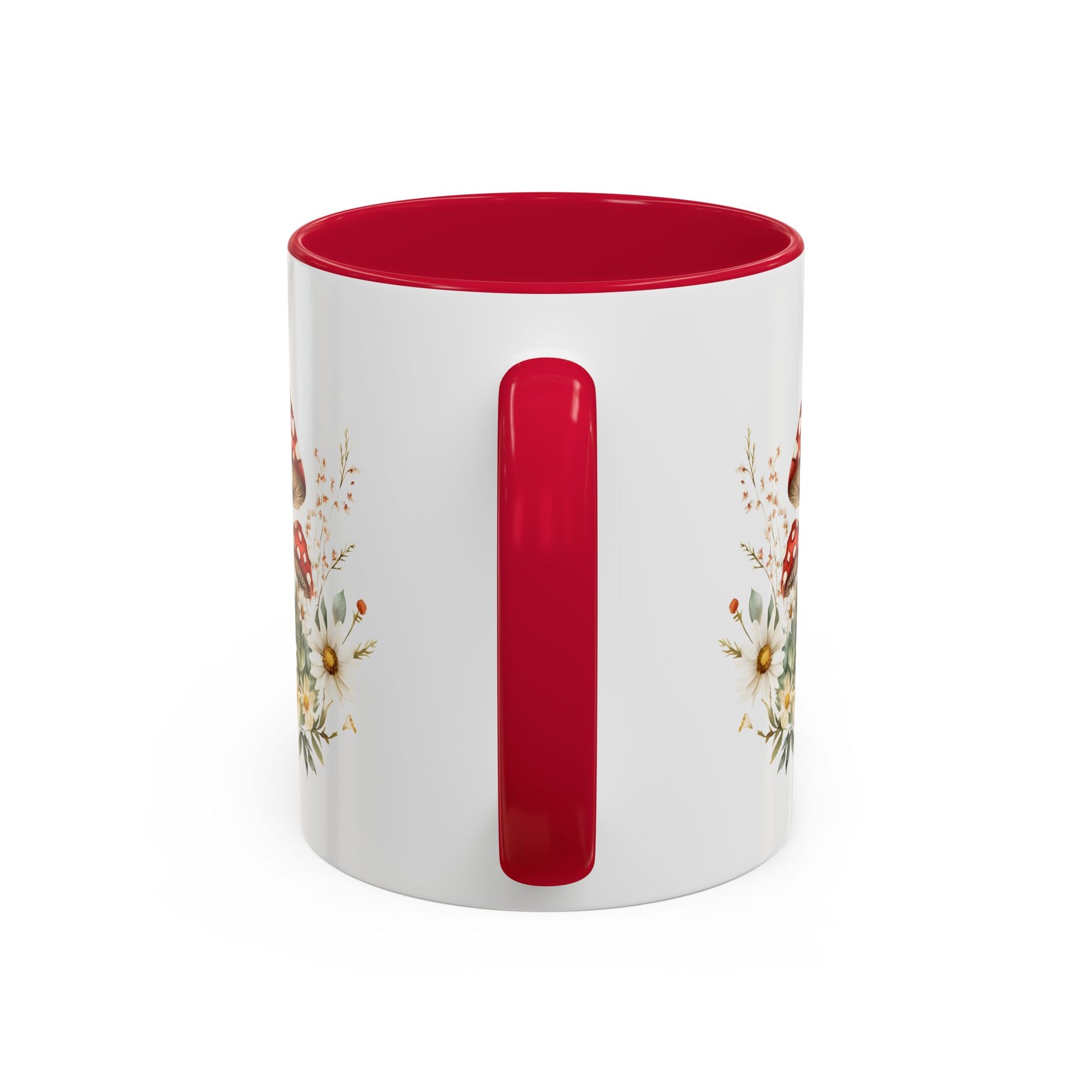 White ceramic mug with red interior and handle, featuring watercolor woodland mushrooms and daisies.