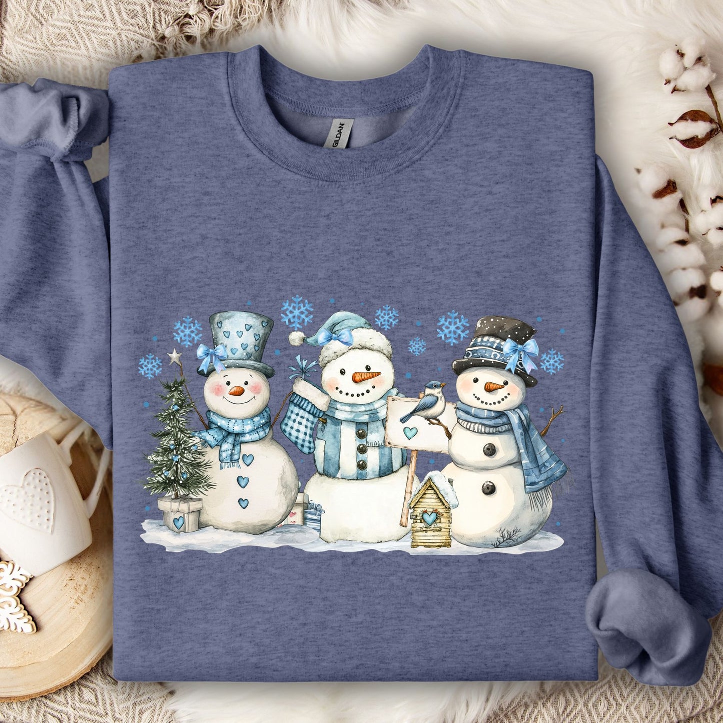Heather Sport Dark Navy sweatshirt with watercolor snowmen, blue hats, scarves, birdhouse, and birds.