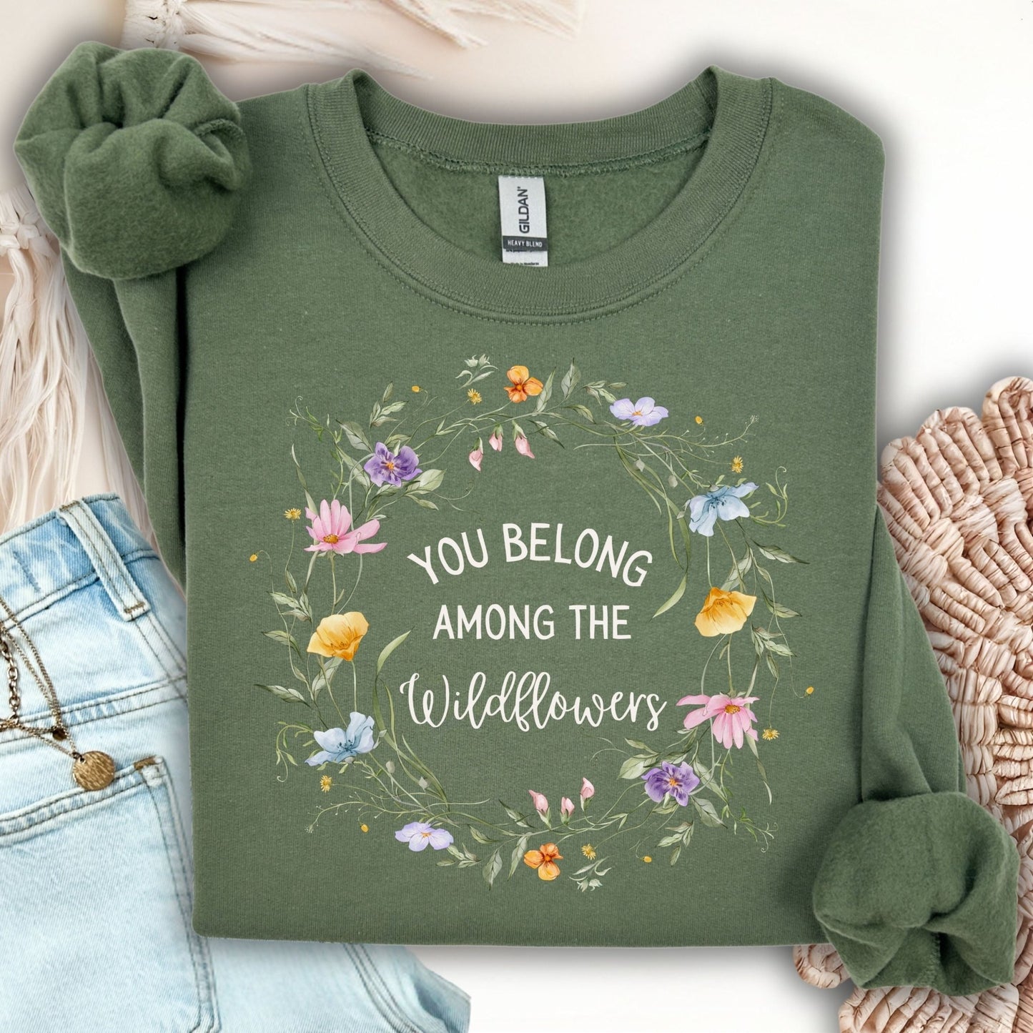 Military Green Gildan sweatshirt with "You belong among the wildflowers" in a watercolor floral wreath.